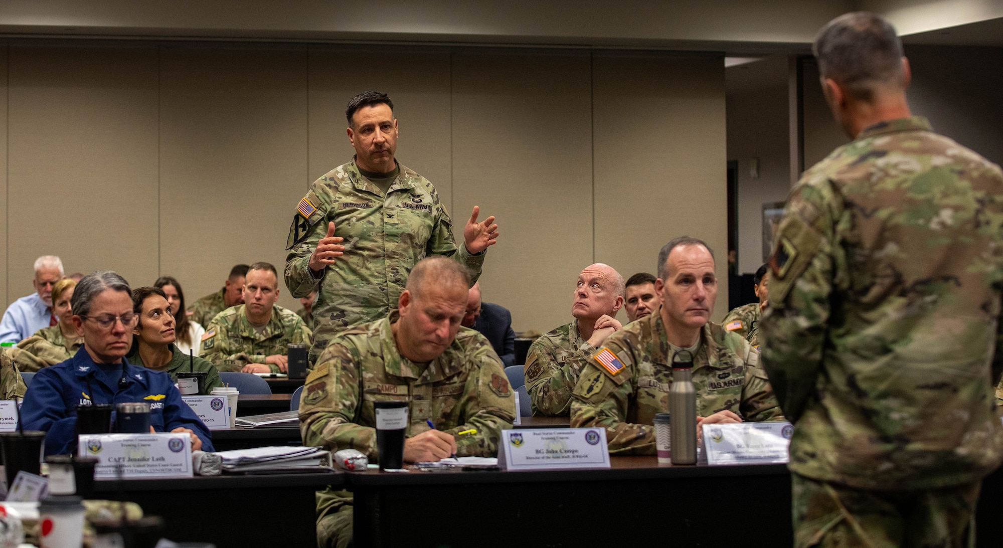 Air Force Gen. Steve Nordhaus, chief, National Guard Bureau, addresses nearly nearly 30 officers at the O-6 level and above, from 50 states, three territories, and the District of Columbia, and active-duty components from across the country during the Dual Status Command Training Course, at the North American Aerospace Defense Command and U.S. Northern Command headquarters on Peterson Space Force Base, Colo., Dec. 13, 2024.