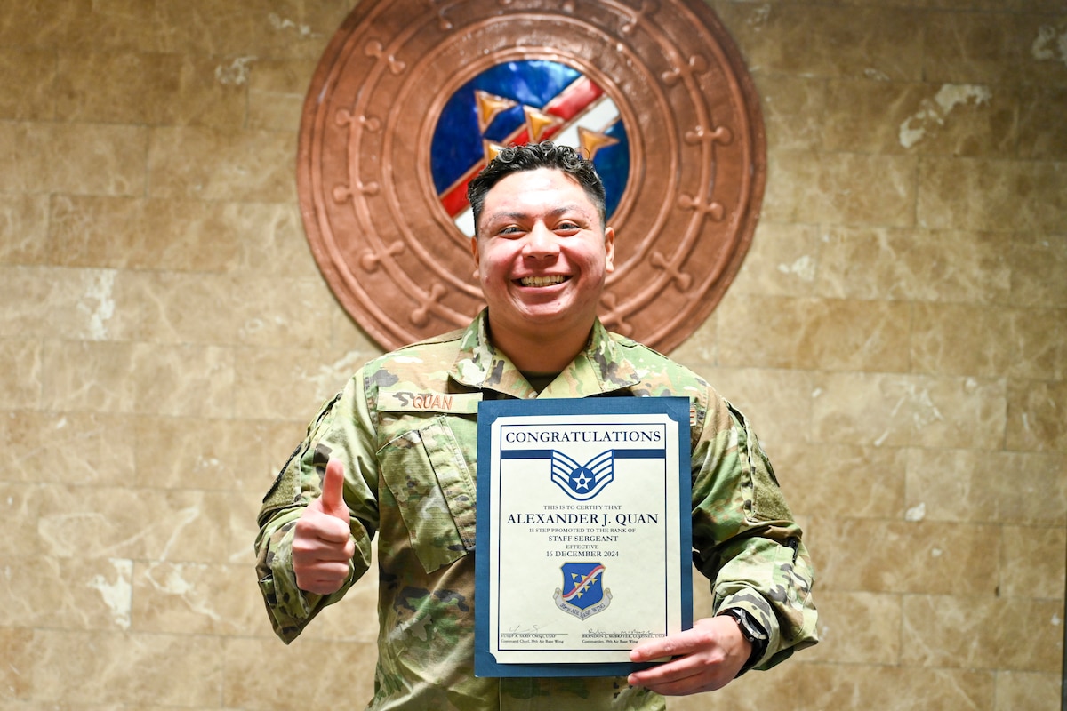 U.S. Air Force Staff Sgt. Alexander Quan, 717th Air Base Squadron, poses for a photo after being notified of his selection for promotion under the Stripes for Exceptional Performers program at Incirlik Air Base, Türkiye, Dec. 16, 2024. The STEP promotion program authorizes commanders to immediately promote enlisted Airmen who exhibit exceptional potential beyond their ranks to the grades of staff and technical sergeant. (U.S. Air Force photo Staff Sgt. Joshua Hoskins)