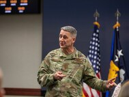 Air Force Gen. Steve Nordhaus, chief, National Guard Bureau, addresses nearly 30 officers at the O-6 level and above, from 50 states, three territories, and the District of Columbia, and active-duty components from across the country during the Dual Status Command Training Course at the North American Aerospace Defense Command and U.S. Northern Command headquarters on Peterson Space Force Base, Colo., Dec. 13, 2024.
