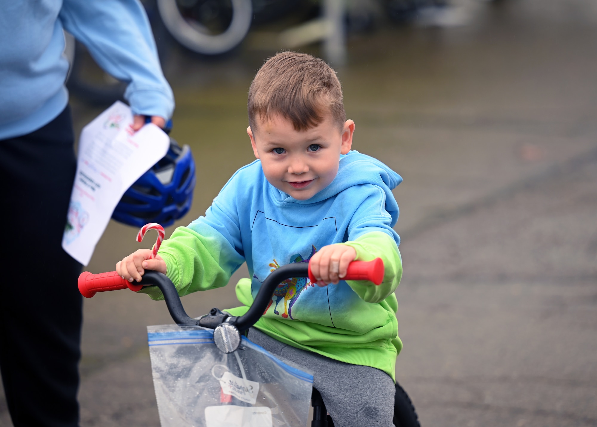 A child riding a bike.