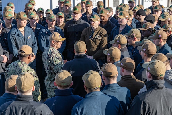 Rear Adm. Chris Cavanaugh, commander, Submarine Group 7, addresses the crew of the Virginia-class fast-attack submarine USS Vermont (SSN 792) during pier-side quarters at Commander, Fleet Activities Yokosuka, Dec. 12.