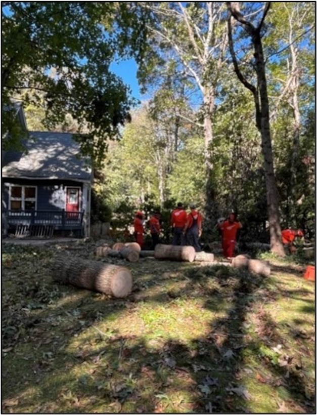 Students assist in Hurricane Helene cleanup at house