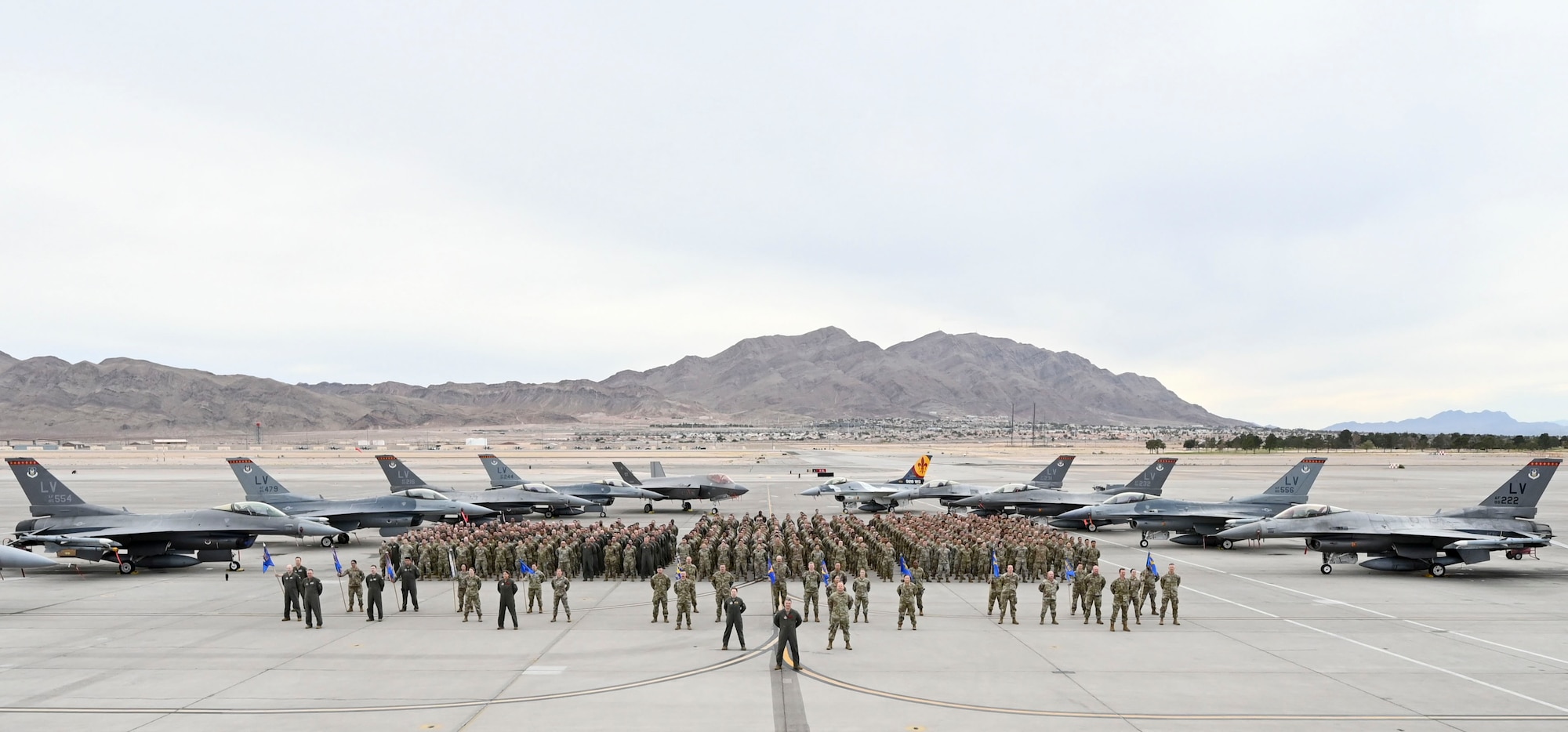 926th Wing gather for a wing photo on the flight line at the Nellis Air Force Base, Nevada.