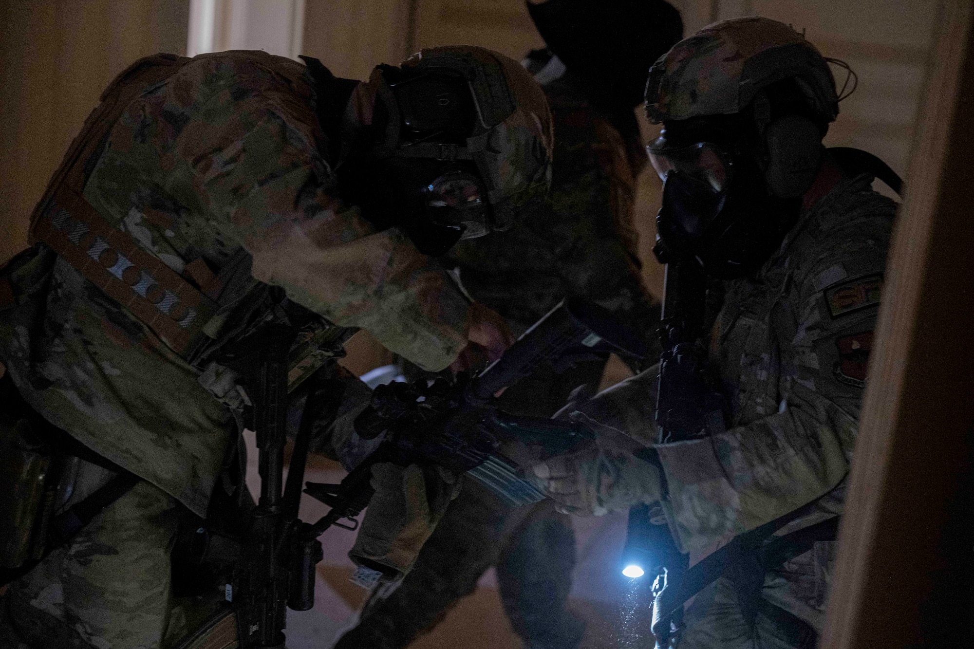 Airmen assigned to the 49th Security Forces Squadron participate in the Regulator Rodeo exercise at Holloman Air Force Base, New Mexico, Dec. 4, 2024. Regulator Rodeo trains 49th SFS Airmen to effectively provide security in regions where control may be limited, while sustaining combat and airfield operations for as long as needed.  (U.S. Air Photo by Airman Elijah Strickland)