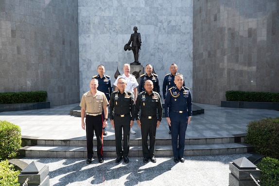 Adm. Samuel J. Paparo, commander of U.S. Indo-Pacific Command, joins Royal Thai Air Force Assistant Commander in Chief Air Chief Marshal Sakesan Kantha for a group photo at the Royal Thai Air Force headquarters in Bangkok, Dec. 17, 2024.