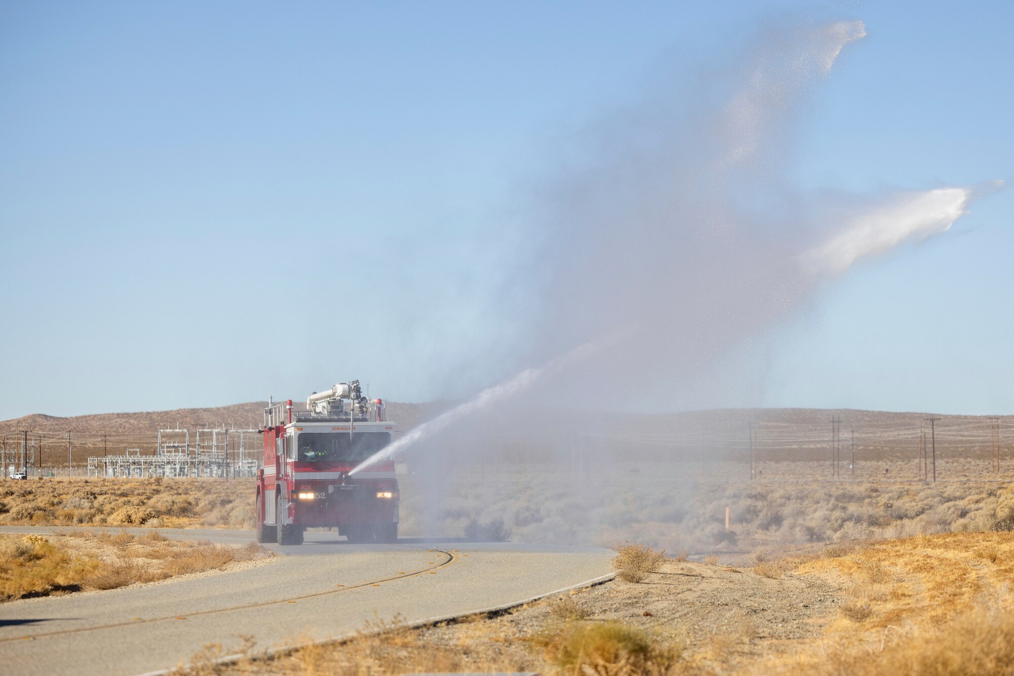 A firetruck from the 812th Civil Engineer Squadron Fire and Emergency Services responds to a fire during a combat readiness exercise at Edwards Air Force Base, California, Dec. 6. (Air Force photo by Lindsey Iniguez)
