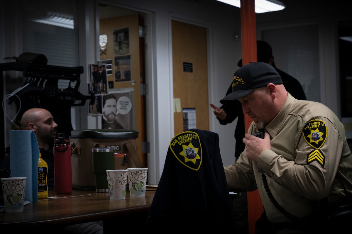 Sgt. Tim Conway, San Francisco Sheriff's Office field training officer, makes a dispatch during Exercise Sourdough in San Francisco, California, Dec. 4, 2024.