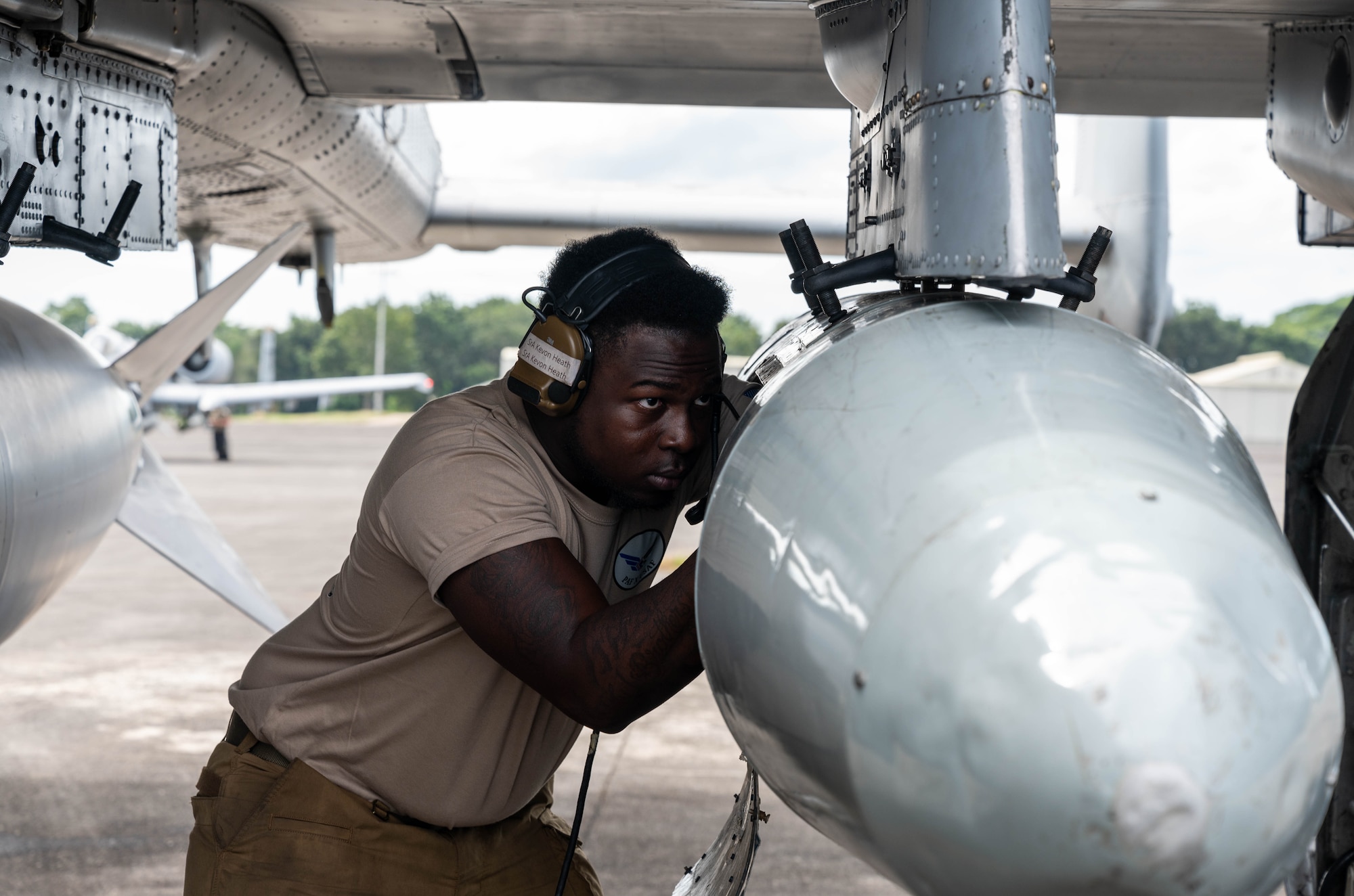 U.S. Air Force Senior Airman Ke’von Heath, 25th Fighter Generation Squadron dedicated crew chief, performs a pre-flight check at Clark Air Base, Philippines, Dec. 14, 2024. The U.S. and Philippine Air Force’s security presence supports the peace and stability that have enabled the Indo-Pacific region to develop and prosper for over 70 years. (U.S. Air Force photo by Staff Sgt. Christopher Tam)