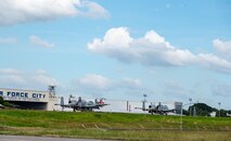 Two U.S. Air Force A-10 Thunderbolt IIs assigned to the 25th Fighter Squadron taxi before a flight back to Osan Air Base from Clark Air Base, Philippines, Dec. 14, 2024.