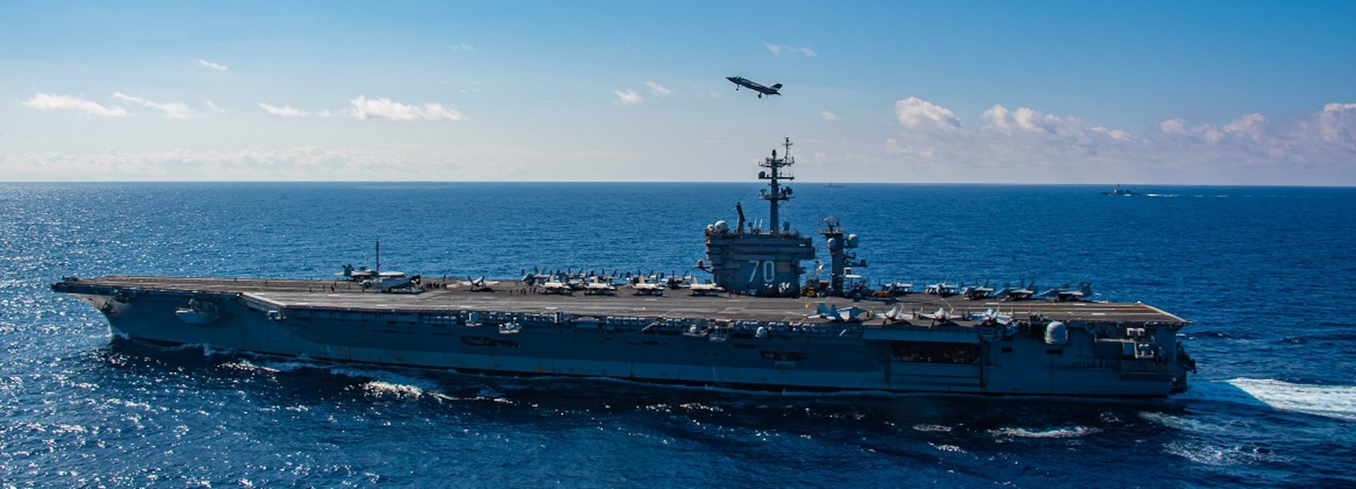 The Nimitz-class aircraft carrier USS Carl Vinson (CVN 70) transits the Philippine Sea with six additional F-35C Lightning II aircraft assigned to the “Argonauts” of Strike Fighter Squadron (VFA) 147, part of Carrier Air Wing FIVE, Dec. 13, 2024.