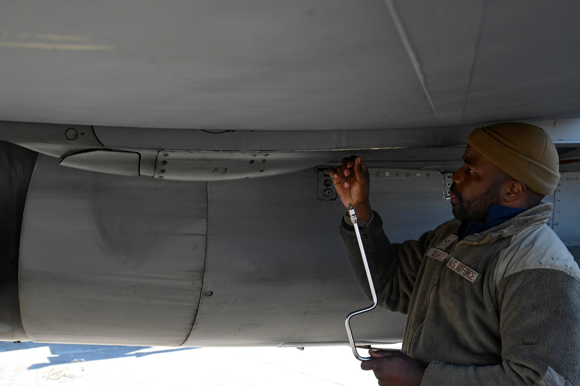 A person fixes an aircraft