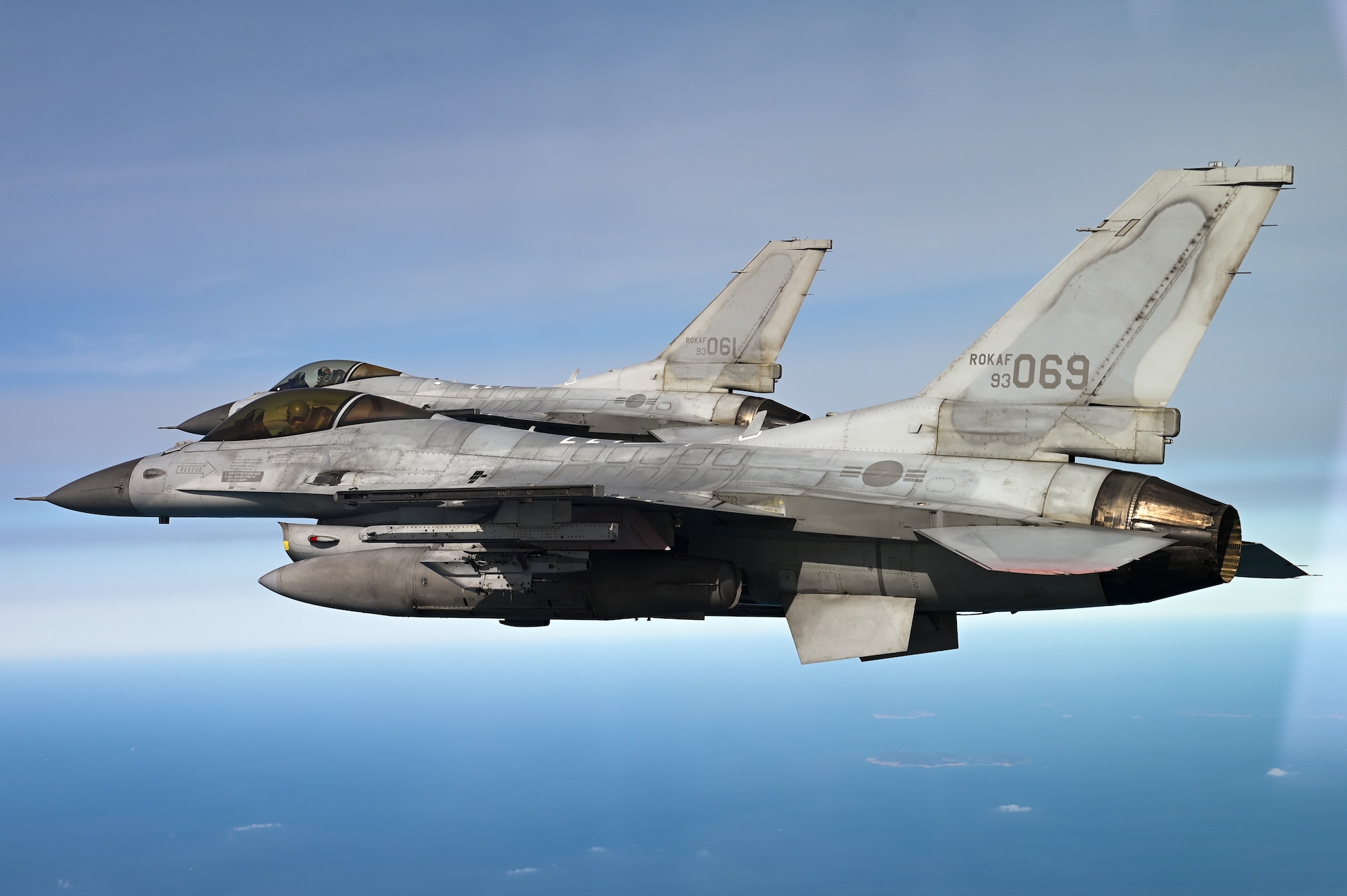 Two Republic of Korea Air Force KF-16 Fighting Falcon aircraft fly in formation