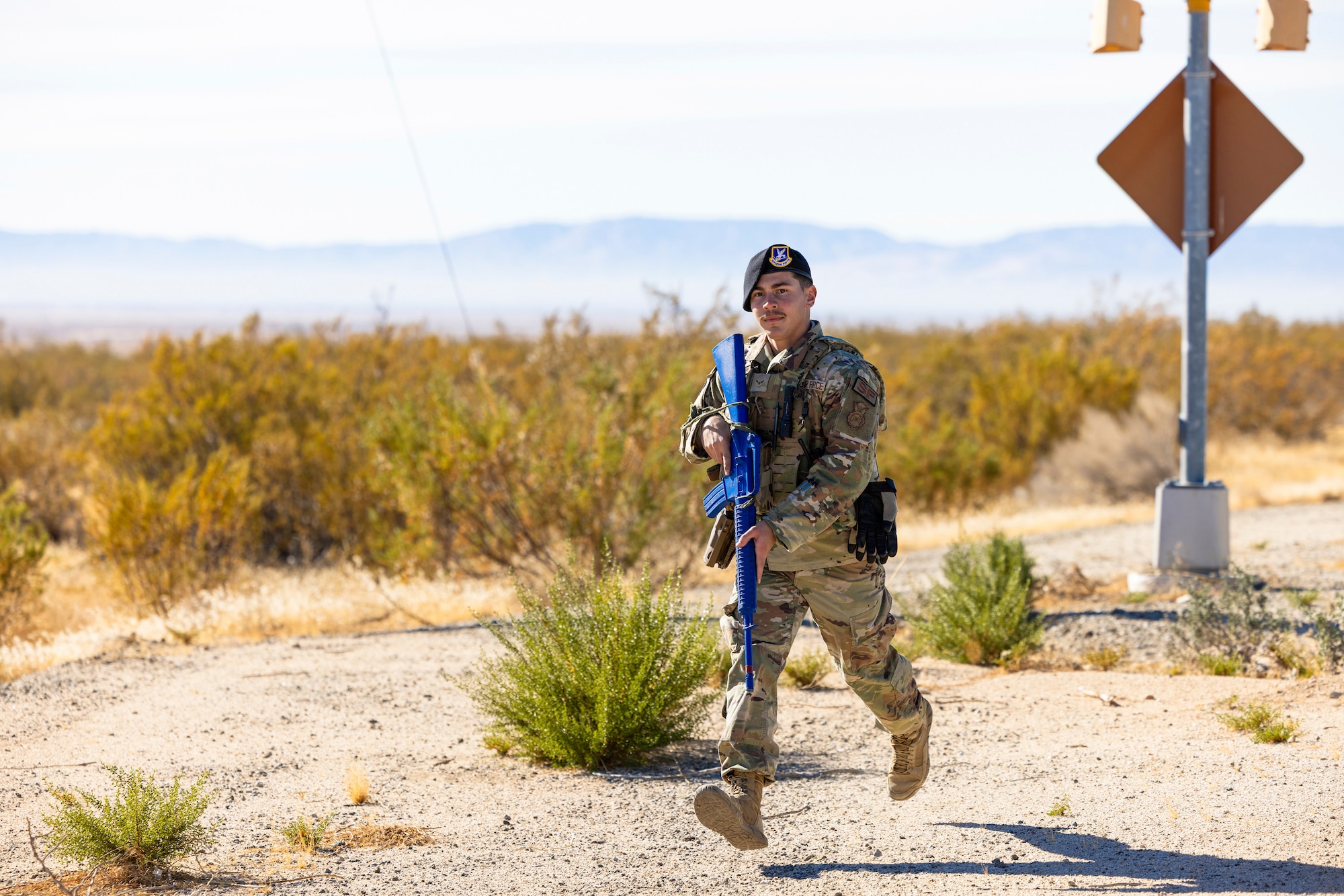 A 412th Security Forces Squadron Airman responds to a threat during a combat readiness exercise at Edwards Air Force Base, California, Dec. 6. (Air Force photo by Lindsey Iniguez)