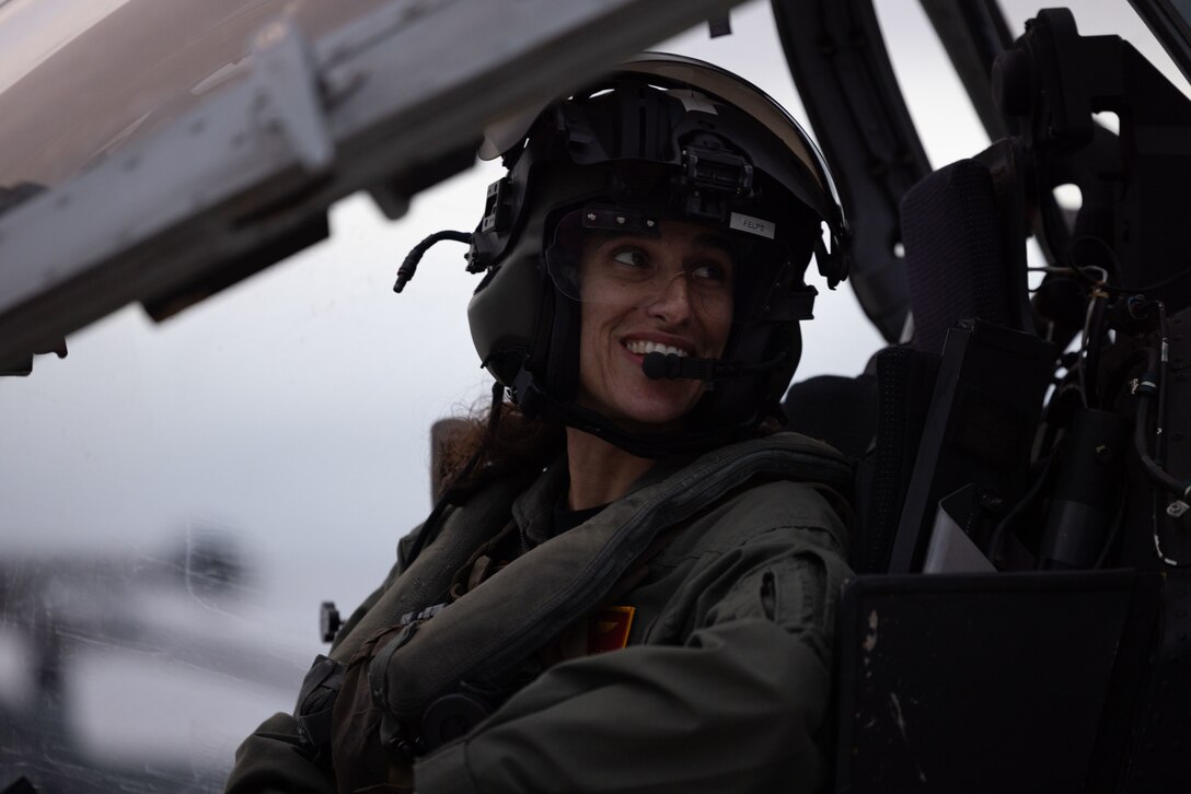 U.S. Marine Corps Lt. Col. Jasmin Moghbeli, a New York native and NASA astronaut, grins after landing an AH-1Z Viper assigned to Marine Light Attack Helicopter Squadron (HMLA) 367, Marine Aircraft Group 39, 3rd Marine Aircraft Wing, at Marine Corps Base Camp Pendleton, Dec. 12, 2024. A former AH-1W Super Cobra pilot with HMLA-367 and Marine Corps test pilot, Moghbeli flew more than 150 combat missions before joining NASA’s Astronaut Corps. She commanded SpaceX Crew-7, spending 199 days in orbit and aboard the International Space Station contributing to experiments and technology demonstrations. (U.S. Marine Corps photo by Lance Cpl. Samantha Devine)