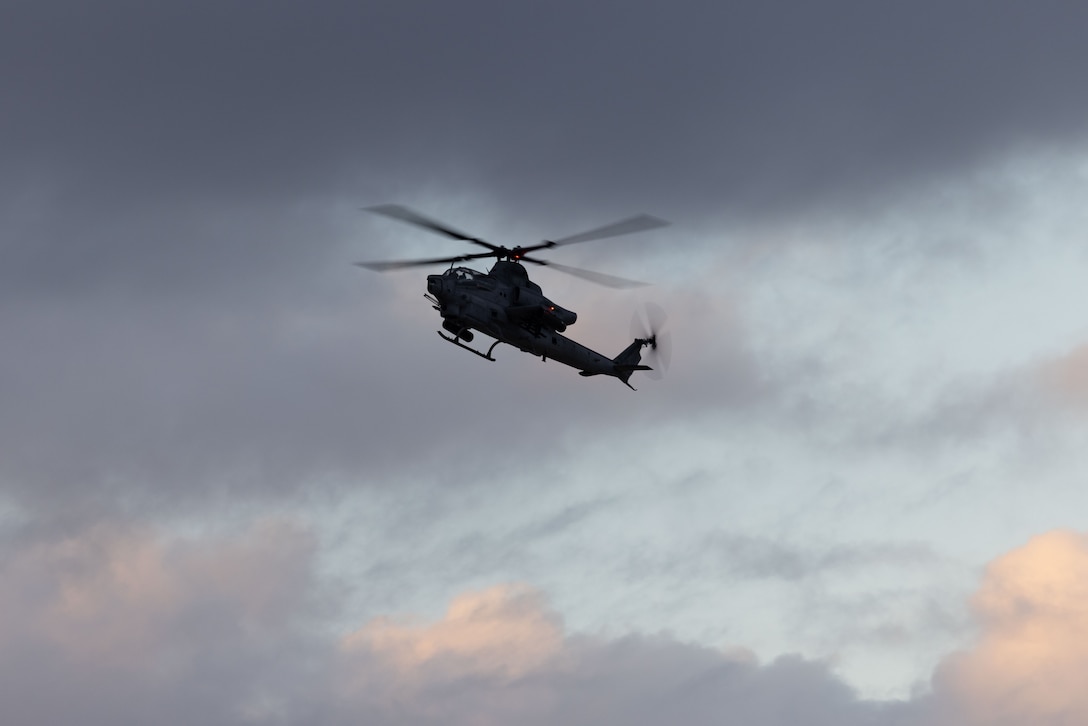 An AH-1Z Viper piloted by U.S. Marine Corps Lt. Col. Jasmin Moghbeli, a New York native and NASA astronaut, and Maj. Chase Laurita, a West Virginia native and pilot with Marine Light Attack Helicopter Squadron (HMLA) 367, Marine Aircraft Group 39, 3rd Marine Aircraft Wing, flies over Marine Corps Base Camp Pendleton, Dec. 12, 2024. A former AH-1W Super Cobra pilot with HMLA-367 and Marine Corps test pilot, Moghbeli flew more than 150 combat missions before joining NASA’s Astronaut Corps. She commanded SpaceX Crew-7, spending 199 days in orbit and aboard the International Space Station contributing to experiments and technology demonstrations. (U.S. Marine Corps photo by Lance Cpl. Samantha Devine)