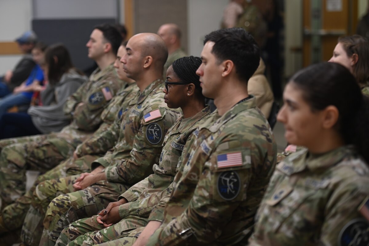 U.S. Space Force Guardians seated in uniform
