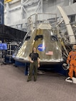 Capt. Megan Mabey, commander of D Company, 116th Brigade Engineer Battalion, poses for a a picture at NASA's Lyndon B. Johnson Space Center in Houston, Texas, in late 2024. In addition to her duties as a member of the Idaho National Guard, Mabey works as a security specialist for NASA.