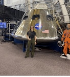 Capt. Megan Mabey, commander of D Company, 116th Brigade Engineer Battalion, poses for a a picture at NASA's Lyndon B. Johnson Space Center in Houston, Texas, in late 2024. In addition to her duties as a member of the Idaho National Guard, Mabey works as a security specialist for NASA.