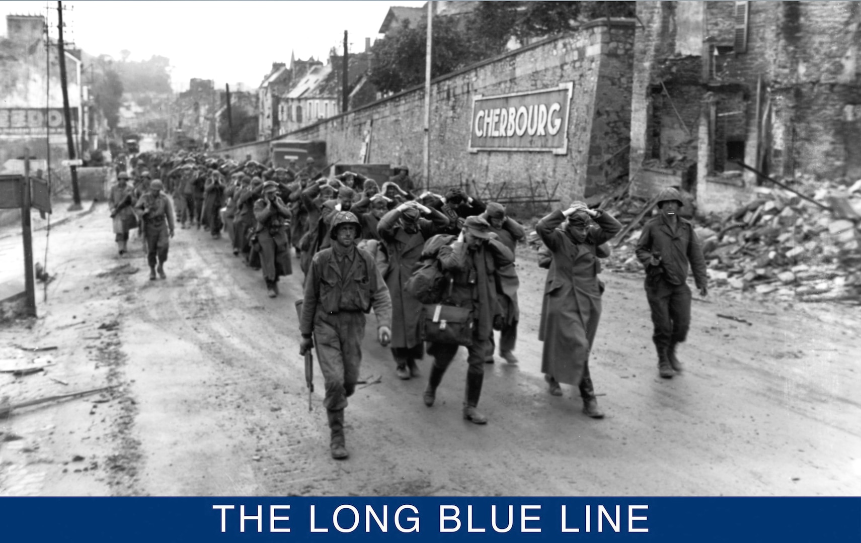 German prisoners march out of surrendered Cherbourg under U.S. Army guard. (U.S. Navy)