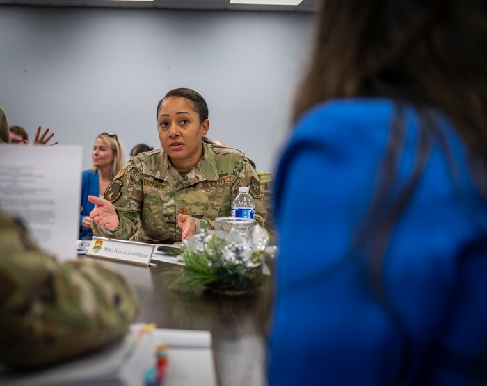The 375th Air Mobility Wing conducted a tabletop Public Emergency Exercise with Scott Air Force Base mission partners on Dec. 13, 2024. The exercise aimed to identify potential gaps in existing response plans, improve interagency collaboration, and ensure all participants clearly understand their roles in a public health crisis. (U.S. Air Force photo by Rachel Sansano)