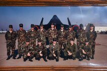 Charlie Toomer, 9th Maintenance Squadron egress systems craftsman, poses with his old egress systems shop in a photo taken in 1983 while he was an active duty Airman at Beale Air Force Base, California.