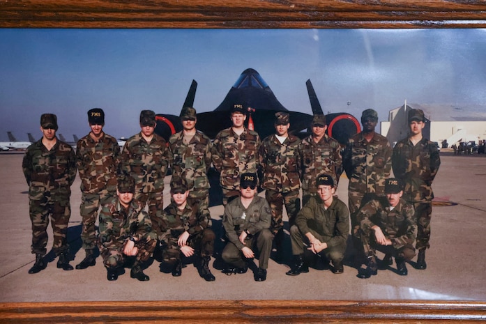 Charlie Toomer, 9th Maintenance Squadron egress systems craftsman, poses with his old egress systems shop in a photo taken in 1983 while he was an active duty Airman at Beale Air Force Base, California.