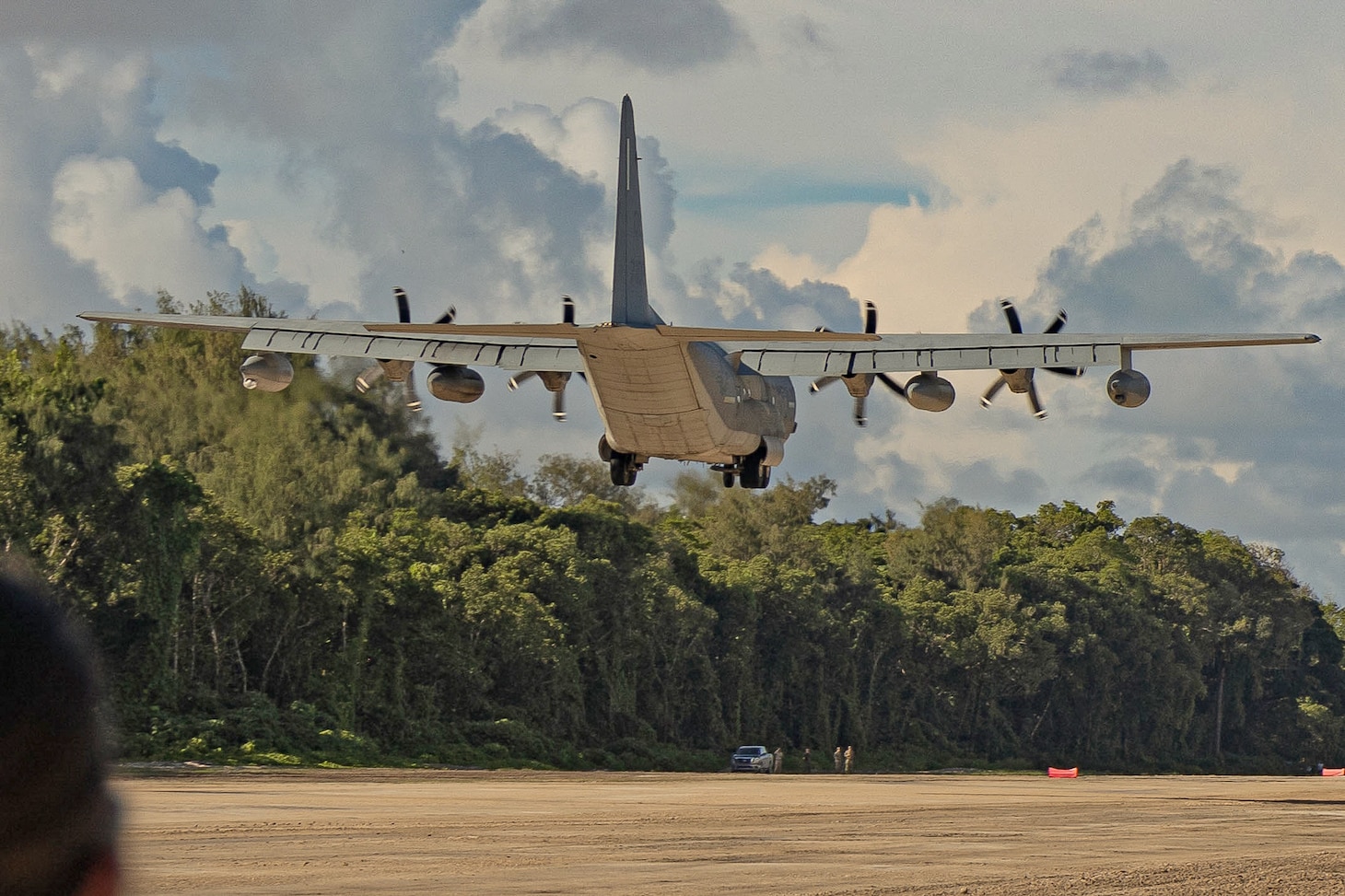 A U.S. Marine Corps KC-130J Super Hercules aircraft with 1st Marine Air Wing, lands on a newly designated airstrip on the island of Peleliu, Republic of Palau, June 22. For the first time since its recertification in June, a military fixed-wing aircraft has touched down on the historic Peleliu airstrip, marking a significant and triumphant return to this iconic World War II site.