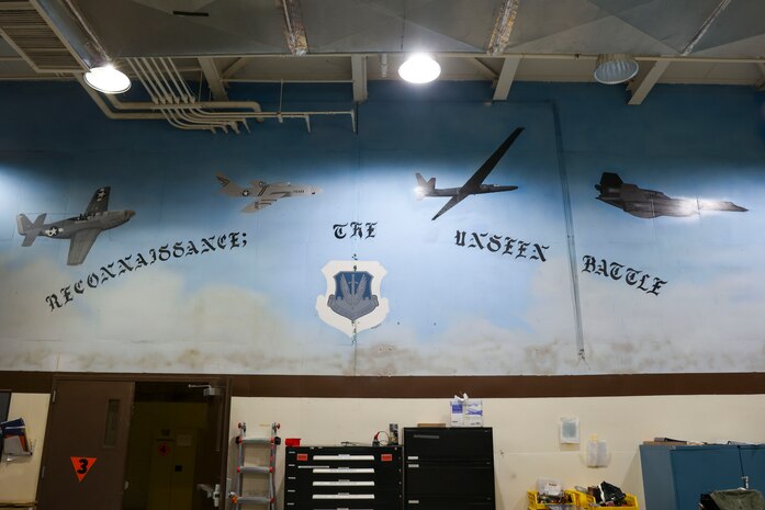 A mural painted in the 9th Maintenance Squadron’s egress systems shop depicts the evolution of reconnaissance aircraft at Beale Air Force Base, Dec. 2, 2024.