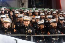 U.S. Marines await the start of the 92nd Hollywood Christmas Parade in Hollywood, California, Dec. 1, 2024. The mission of the Toys for Tots Holiday Program is to collect new, unwrapped toys, books, and other gifts and distribute them to less fortunate children at Christmastime. The Hollywood Christmas Parade is an annual American parade held on the Sunday after Thanksgiving in Hollywood; it follows a 3.5-mile route along Hollywood Boulevard, then back along Sunset Boulevard, featuring various celebrities. (U.S. Marine Corps photo by Cpl. Fred Garcia)