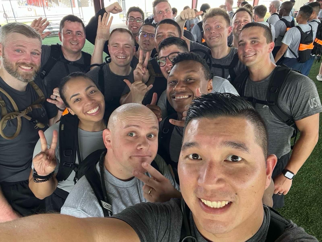 A group of guardians pose for a selfie.