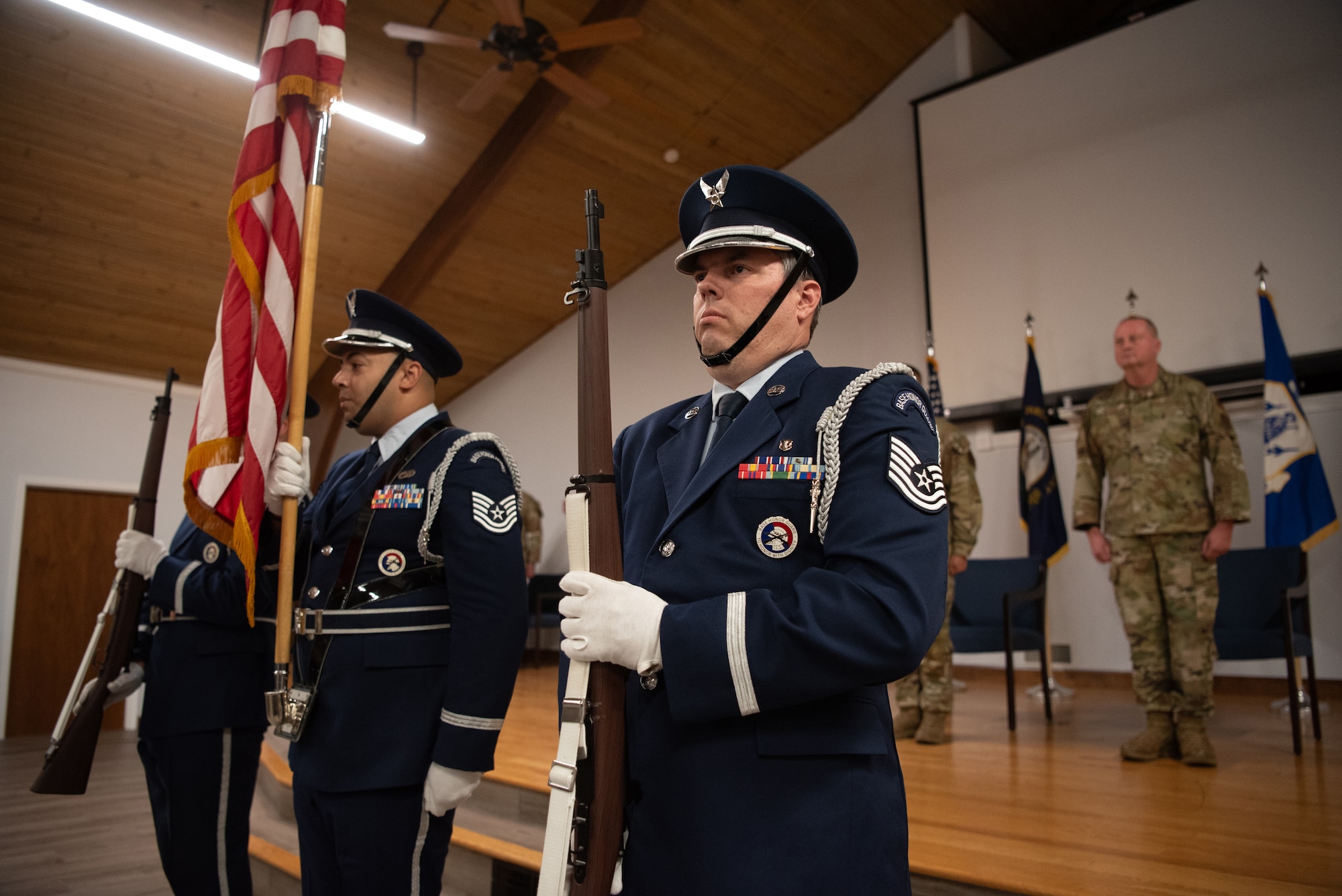 The 123rd Airlift Wing Color Guard presents the colors during a retirement ceremony at the Kentucky Air National Guard Base in Louisville, Ky., Oct. 13, 2024, for Chief Master Sgt. Gregory Myers, 123rd Security Forces Squadron manager. Myers is retiring after 30 years of service to the active-duty Air Force and Air National Guard. (U.S. Air National Guard photo by Master Sgt. Joshua Horton)