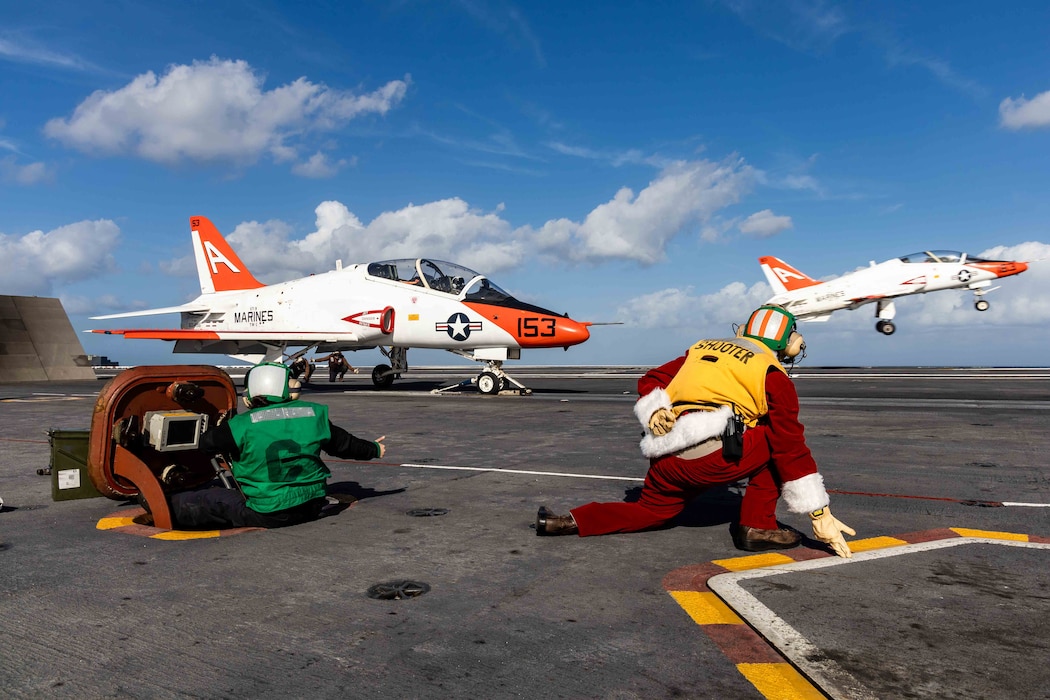 Lt. Melvin Whitehurst prepares to launch a T-45C Goshawk training aircraft from TW-2 during flight operations aboard USS George H.W. Bush (CVN 77) in the Atlantic Ocean.