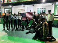 U.S. Air National Guard Tech. Sgt. Gerardo Balsa and Staff Sgt. Grant Cozart, defenders with the 105th Airlift Wing’s Base Defense Group, pose with fellow graduates at the Brazilian Jungle Warfare School in Manaus, Brazil, Nov. 22, 2024. Balsa and Cozart are two of only 50 American military members to complete the course since it was established in 1964 to develop an operational unit that could use the Amazon jungle environment to its advantage.