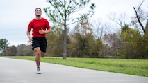 U.S. Marine Corps Poolee Dilon Cabrera, the platoon guide with Recruiting Sub Station Beaumont, Recruiting Station Houston, participates in a 1.5-mile run during an initial strength test at Gulf Terrace Park in Beaumont, Texas, Dec. 14, 2024. Poolees with RSS Beaumont were evaluated on their pull-ups, ammo can lifts, plank, and 1.5-mile run in order to prepare them for recruit training. (U.S. Marine Corps photo by Sgt. Ryan H. Pulliam)