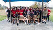 U.S. Marines, poolees, and guests with Recruiting Sub Station Beaumont, Recruiting Station Houston, pose for a photo after an initial strength test at Gulf Terrace Park in Beaumont, Texas, Dec. 14, 2024. The poolees were evaluated on their pull-ups, ammo can lifts, plank, and 1.5-mile run in order to prepare them for recruit training. (U.S. Marine Corps photo by Sgt. Ryan H. Pulliam)