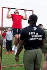 U.S. Marine Corps Poolee Jose Valdovinos, with Recruiting Sub Station Beaumont, Recruiting Station Houston, executes a pull-up during an initial strength test at Gulf Terrace Park in Beaumont, Texas, Dec. 14, 2024. Poolees with RSS Beaumont were evaluated on their pull-ups, ammo can lifts, plank, and 1.5-mile run in order to prepare them for recruit training. (U.S. Marine Corps photo by Sgt. Ryan H. Pulliam)