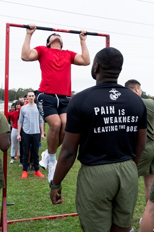 U.S. Marine Corps Poolee Jose Valdovinos, with Recruiting Sub Station Beaumont, Recruiting Station Houston, executes a pull-up during an initial strength test at Gulf Terrace Park in Beaumont, Texas, Dec. 14, 2024. Poolees with RSS Beaumont were evaluated on their pull-ups, ammo can lifts, plank, and 1.5-mile run in order to prepare them for recruit training. (U.S. Marine Corps photo by Sgt. Ryan H. Pulliam)