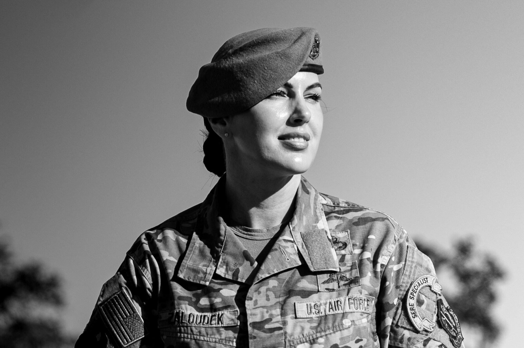 Military woman poses for photo.