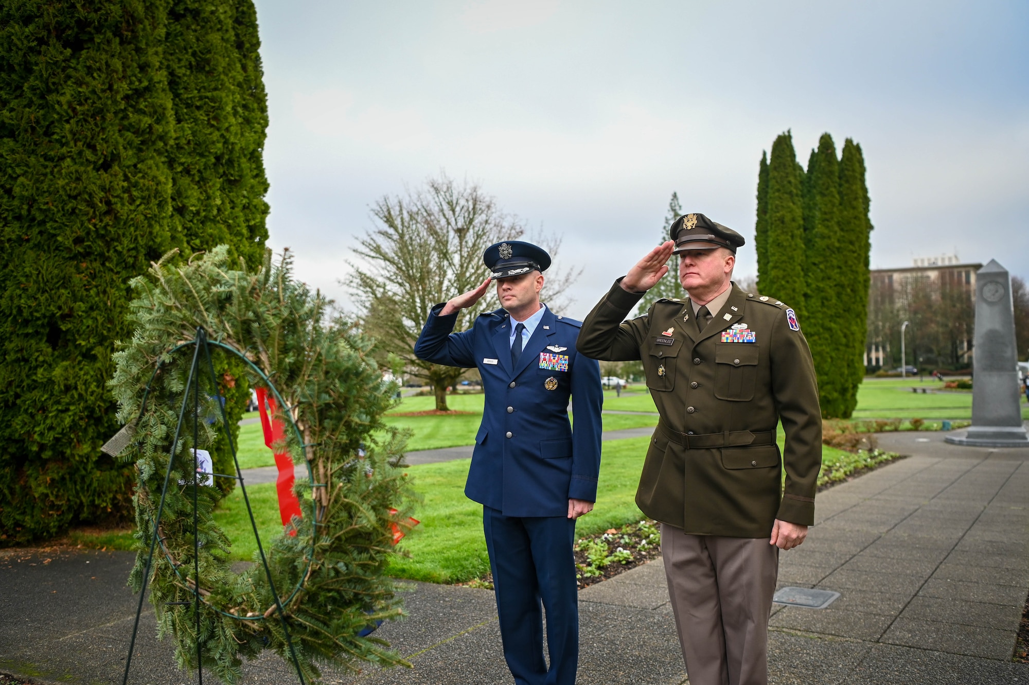 Wreath laying on head stone.