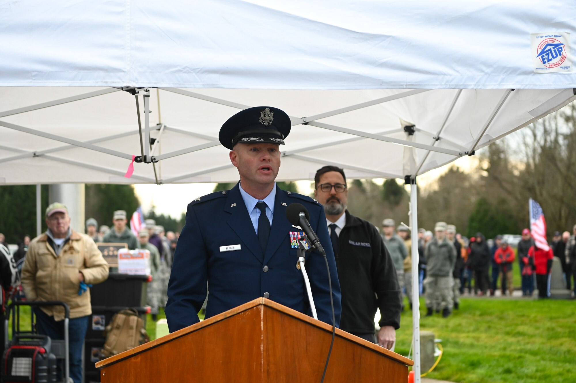 Wreath laying on head stone.