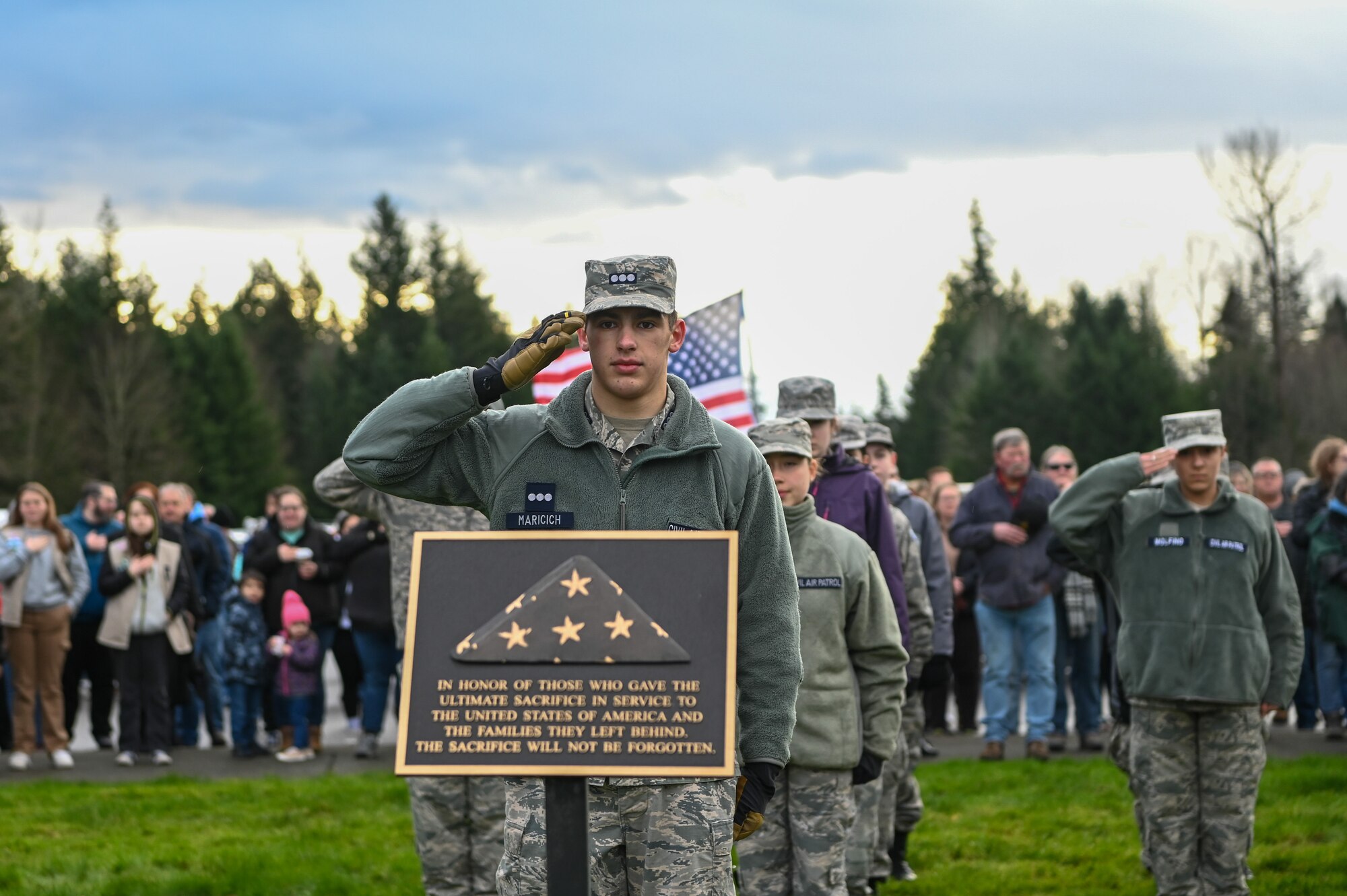 Wreath laying on head stone.