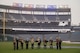 service members throwing a ball