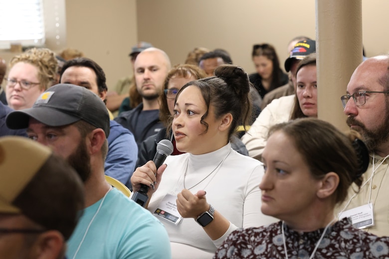 Participants at the Military Munitions Support Services, M2S2, Conference pictured asking questions.