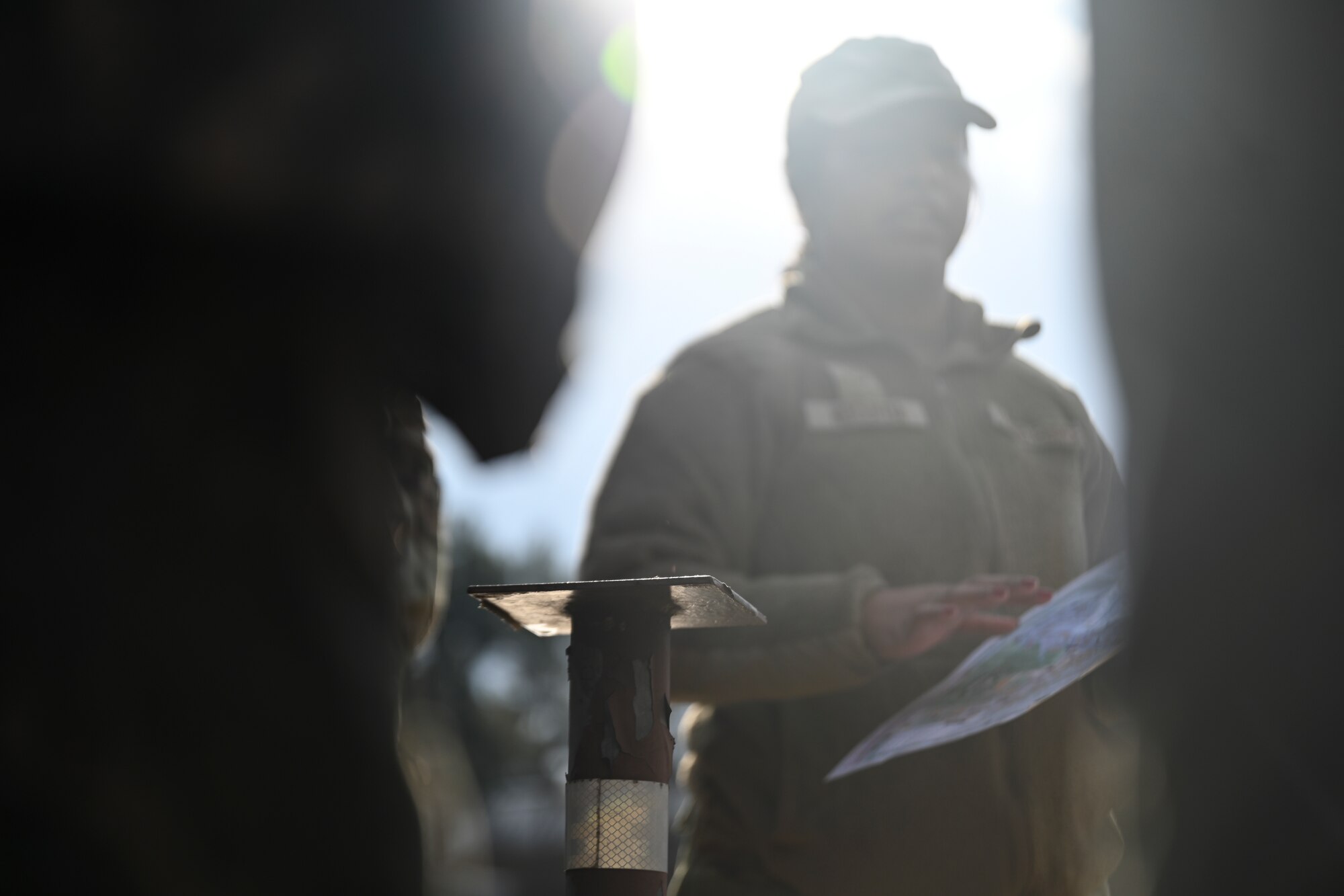 irman 1st Class Vanessa Nogueda-Castaneda, 8th Civil Engineer Squadron installation office of emergency management apprentice, briefs Republic of Korea Air Force Airmen on locations and procedures for utilizing M8 paper during Chemical, Biological, Radiological, and Nuclear training at Kunsan Air Base