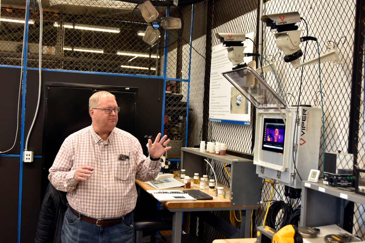 Dan Henley, a predictive maintenance manager at Arnold Air Force Base, discusses the infrared camera project for which he was awarded Arnold Engineering Development Complex Innovation Spark Tank program funding in early 2024. The system is currently on display in the Innovation Lab at Arnold AFB, Tenn., and Henley demonstrated the capability during a Dec. 12, 2024, tour of the facility given for Airmen at Arnold. The Innovation Lab was recently reopened following a renovation, and the facility features 3D printing and scanning capabilities, a computer lab, an environmental chamber, a shock tube and a small-scale wind tunnel. (U.S. Air Force photo by Bradley Hicks)