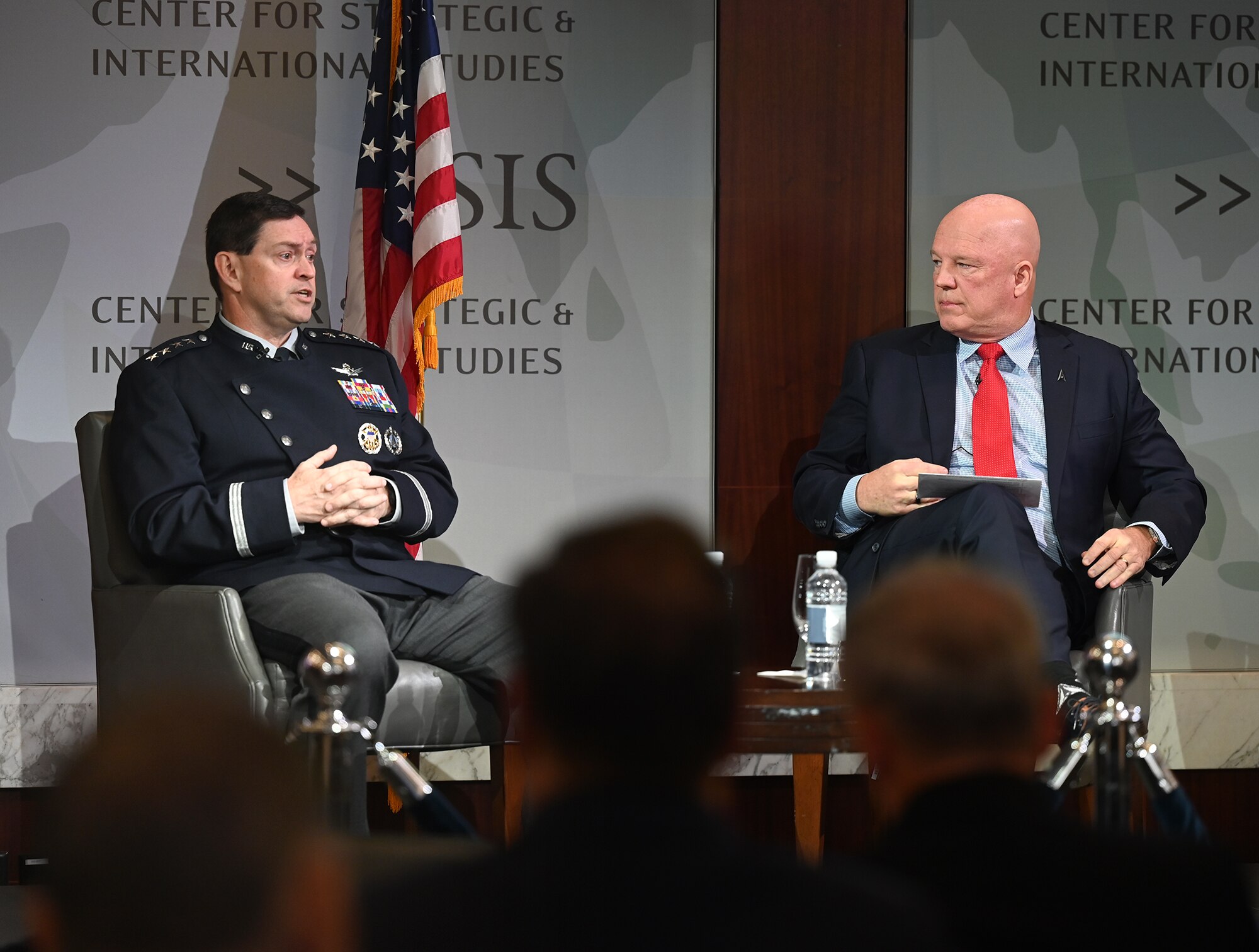 Space Force leadership speaks on panel in front of an audience.
