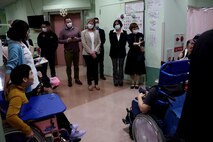 241217-N-DO281-1009 OKINAWA, Japan (Dec. 17, 2024) – Navy Medicine Readiness and Training Command Okinawa leadership take a tour of Okinawa Southern Medical and Rehabilitation Center during a toy drive in Okinawa, Japan, Dec. 17, 2024. (U.S. Navy photo by Mass Communication Specialist 1st Class Trey Fowler)