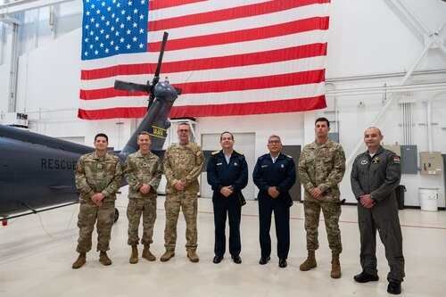 Lt. Gen. Carlos Enrique Chavez Cateriano, the Peruvian Air Force Chief of Staff, and Peruvian Air Force Senior Enlisted Leader Tecnico Supervisor Mayor Walter Silva stand surrounded by leaders from the Inter-American Air Forces Academy
