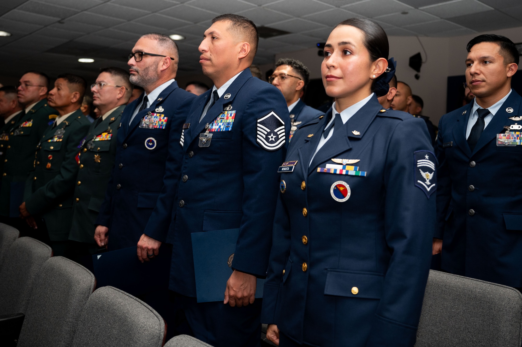International military students stand following their graduation from the Inter-American Air Forces Academy