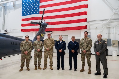 Lt. Gen. Carlos Enrique Chavez Cateriano, the Peruvian Air Force Chief of Staff, and Peruvian Air Force Senior Enlisted Leader Tecnico Supervisor Mayor Walter Silva stand surrounded by leaders from the Inter-American Air Forces Academy